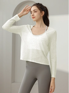 Haut de sport respirant à manches longues pour femme en tissu blanc semi-transparent