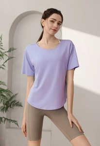 Detail of lavender moisture-wicking sports t-shirt and khaki fitness biker shorts set