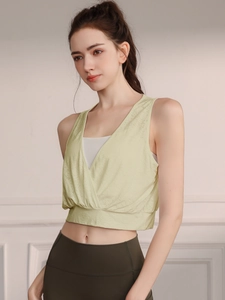 Women's light green cross V-neck sports vest with white inner bra for yoga and fitness