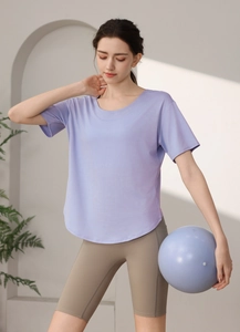 Close-up of lavender quick-dry sports t-shirt with curved hem and breathable fabric