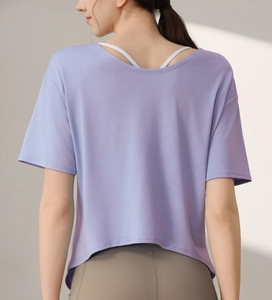 Detail view of purple camouflage mesh workout t-shirt with open back and breathable texture