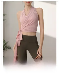 Top yoga rosa slim con lacci incrociati e leggings a vita alta per fitness e sport