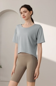 Detail of loose fit camouflage burnout sports tee and high waist biker shorts set