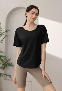 Detail of loose fit black camo sports t-shirt with curved hem for yoga and fitness