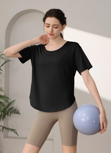 Detail view of quick-dry camouflage workout t-shirt and high-waist fitness yoga leggings