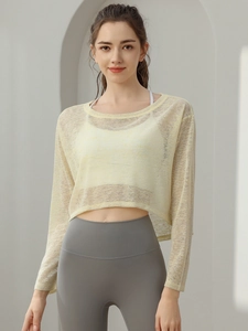 Ademende lichtgele mesh crop top yoga shirt met lange mouwen voor fitness en training