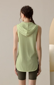 Rear view of loose fit hooded sports vest for women in light green breathable fabric