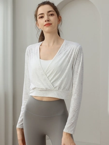 White jacquard long sleeve yoga top with wrap design and breathable mesh texture