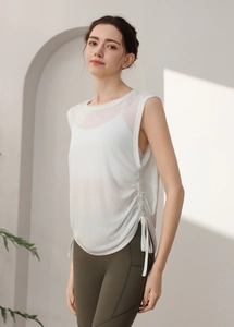 Detail of white breathable workout tank top with adjustable side drawstring and ruching