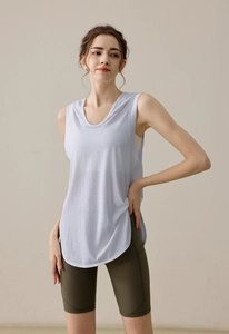 Detail of lavender loose hooded sports vest with curved hem for running and fitness yoga