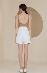 Vue arrière du short de sport blanc double couche à taille haute pour femme running fitness