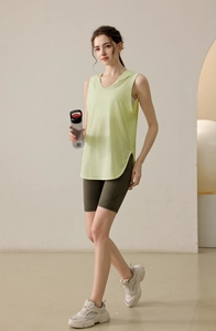 Detail view of the breathable side slit design on this loose fit hooded sports tank top