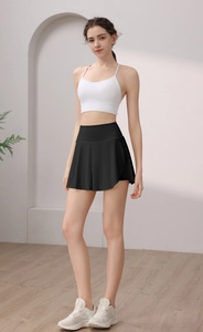 Vue détaillée de la jupe de sport plissée noire en nylon avec taille haute élastique