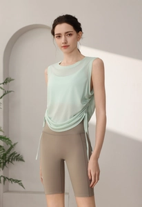 Detail of light green sleeveless sports vest with adjustable drawstring ruched side design
