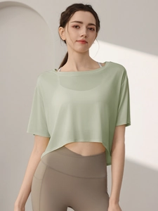 Women's light green loose yoga cropped top with breathable short sleeves for fitness
