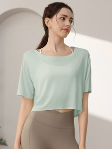 Loose fit pale green short sleeve yoga crop top for women made of breathable Tencel fabric