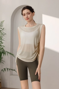 Detail view of breathable off-white sports vest with side drawstring and ruching texture