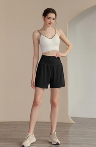 Short de yoga noir taille haute pour femme, coupe trapèze ample avec ceinture élastique