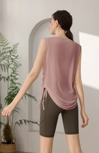 Detail of adjustable drawstring on a breathable yoga tank top with side pockets shorts