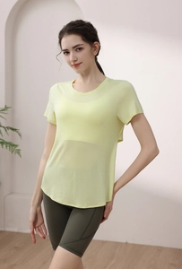 Close-up of lightweight yellow modal yoga tee with breathable quick-dry fabric texture