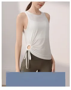Detail of white sports tank top with side drawstring cutout and breathable mesh fabric
