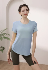 Detail of light blue Modal sports top with curved hem and breathable quick-dry fabric