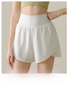 Detail of high waisted white sports shorts with petal-shaped hem and ribbed waistband