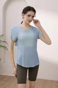 Macro detail of the light blue modal yoga top showing breathable quick-dry fabric texture