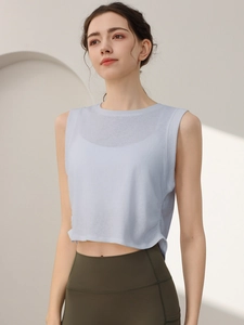 Canotta sportiva crop top azzurra senza maniche per corsa da donna e yoga fitness