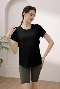 Short sleeve modal yoga top for women featuring a curved hem and open back detail