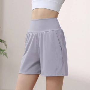 Women's high-waisted lavender yoga shorts with side pockets and slim fit design