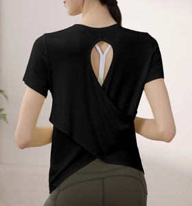 Rear view of black modal sports top with teardrop cutout and crossed hem design