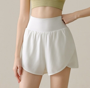 Detail of white high-waisted sports shorts with double-layer anti-exposure design