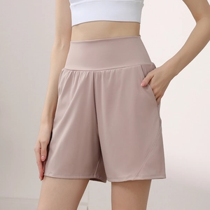 High-waisted women's quick-dry sports shorts with side pockets in pale purple for yoga