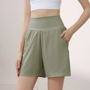 Sage green high-waisted fitness shorts for women with side pockets and elastic waistband