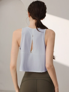 Débardeur de sport violet en maille filet avec fente au dos et coupe courte pour yoga