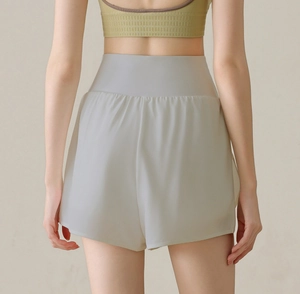 Rear view of high waist quick dry sports shorts with racerback yoga sports bra