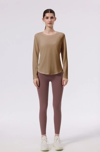 Detailed close-up of four-needle six-thread yoga set with high elastic long sleeve top