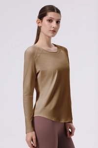 Detail of a dark khaki women's yoga long sleeve shirt featuring high elasticity fabric