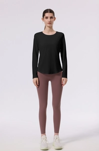 Detailed front view of high-elasticity black long sleeve sports top for yoga and fitness