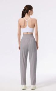 Detail of high waisted wide leg grey yoga pants with premium drape fabric for workout