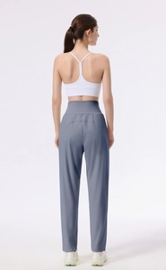 Close-up of wide waistband on high-waist yoga pants for tummy control and slimming effect