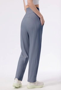 Side view of high-waisted wide-leg yoga pants in misty blue with seamless pockets