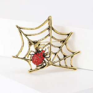 Creative spider web brooch with red rhinestones and antique gold finish jewelry
