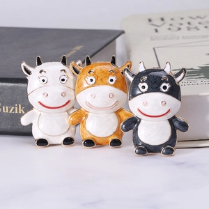 Creative enamel cow brooches set featuring white, yellow and grey cartoon animal pins