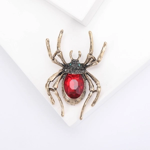 Gothic-Spinne-Brosche in Antikgold mit rotem Kristall und dunklen Strasssteinen verziert