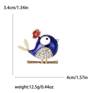 Blue enamel bird brooch with white crystals and gold plating, dimensions shown in inches