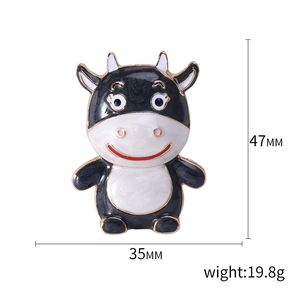 Cartoon enamel cow brooch badge in black and white finish, size 47mm by 35mm dimensions