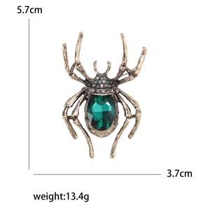 Vintage-Spinne-Brosche in Gold mit grünem Edelstein und Kristalldetails, Größe 5,7cm x 3,7cm