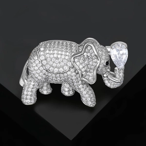 Macro detail of elephant brooch with silver plating and white micro-set zircon crystals